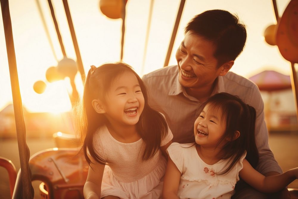 Asian family cheerful laughing sunset.