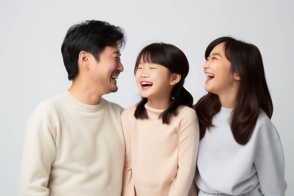 Asian middle age parents and children talking together cheerful laughing adult.