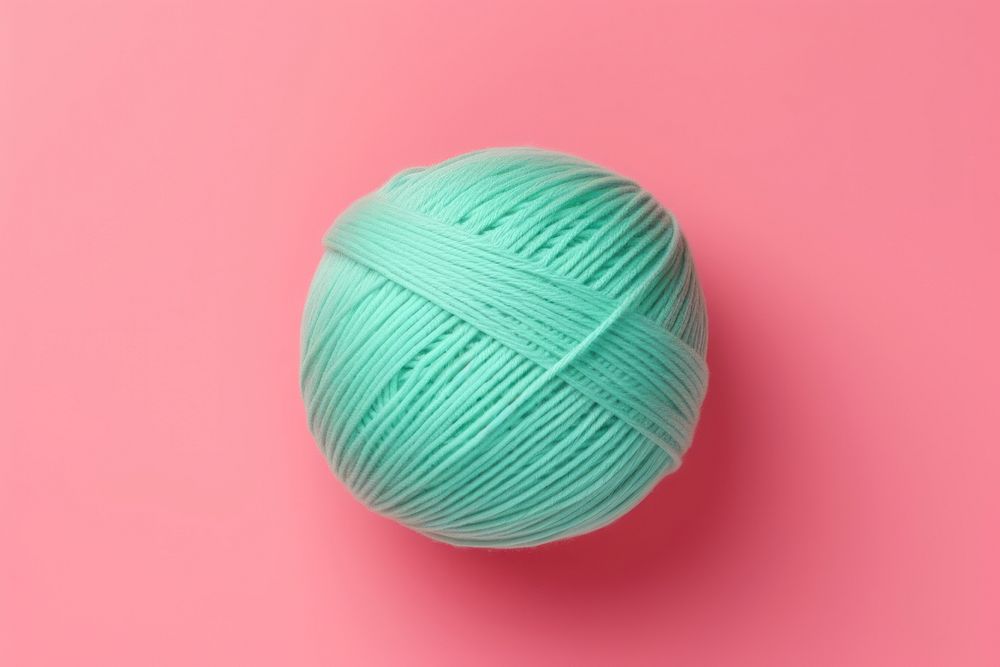 Yarn ball wool turquoise material.