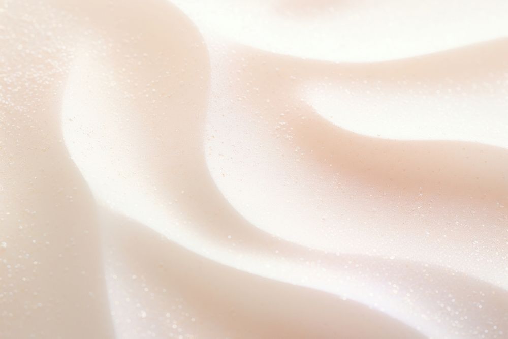 Pale glitter cream texture backgrounds white abstract.