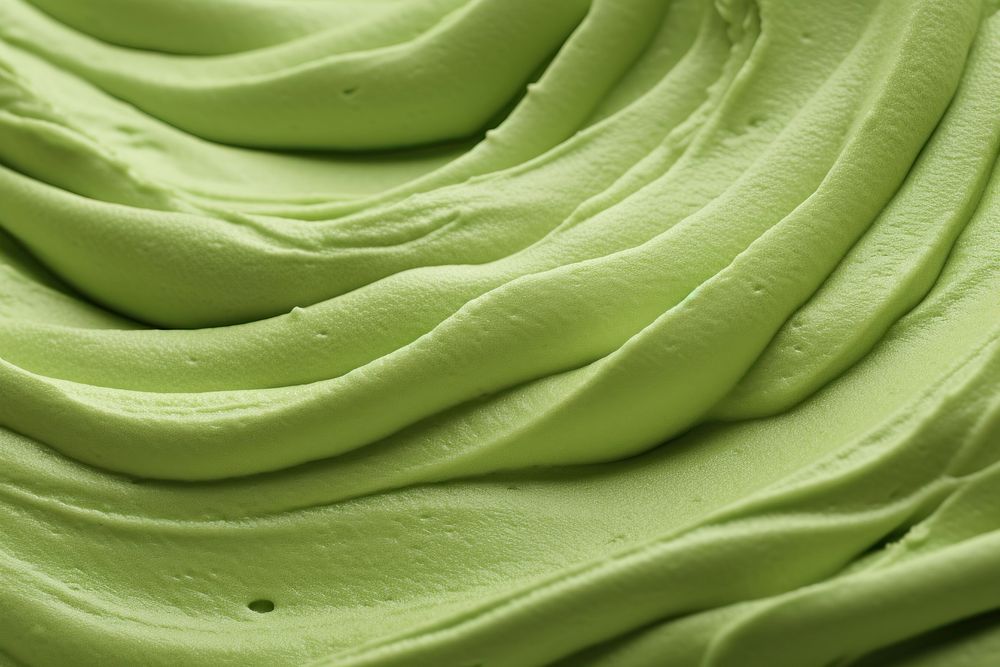Ice cream texture green icing food.