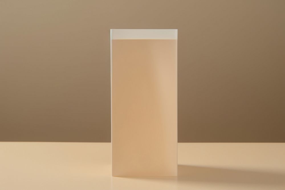 Juice box packaging lamp thermometer studio shot.