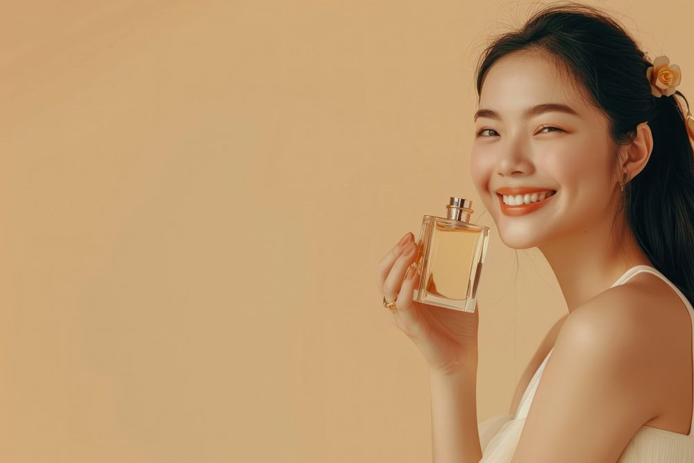 Woman smelling perfume smiling smile happiness.