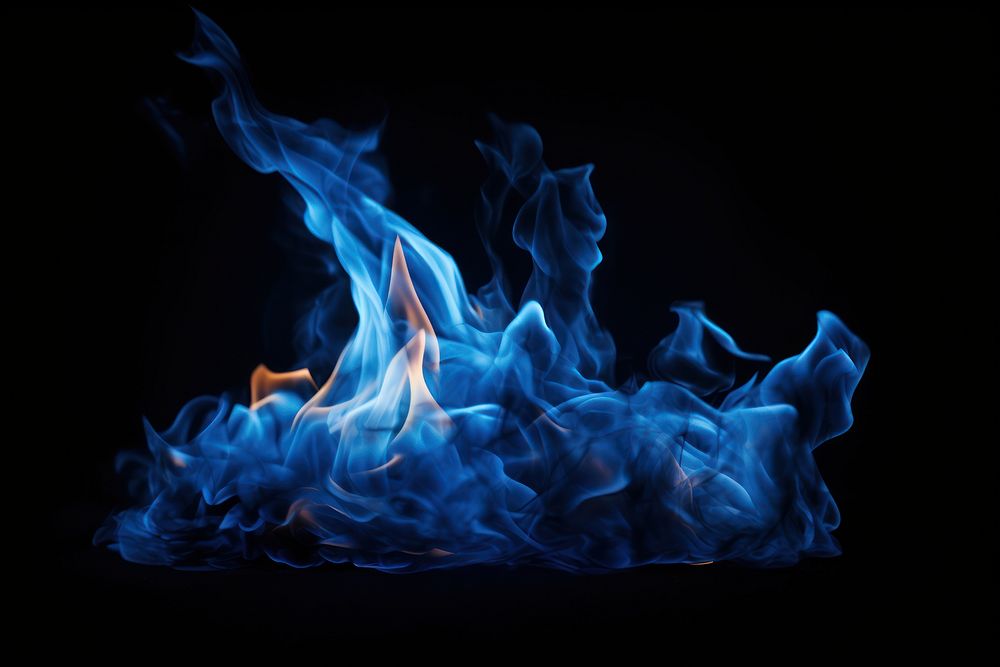 Blue mountain fire flame bonfire black background illuminated.