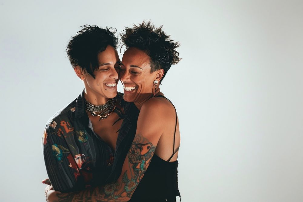 A gay couple laughing portrait jewelry.