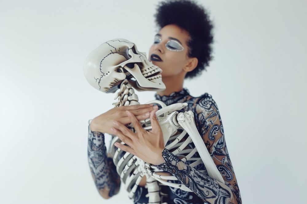 Dances with a human skeleton portrait adult woman.