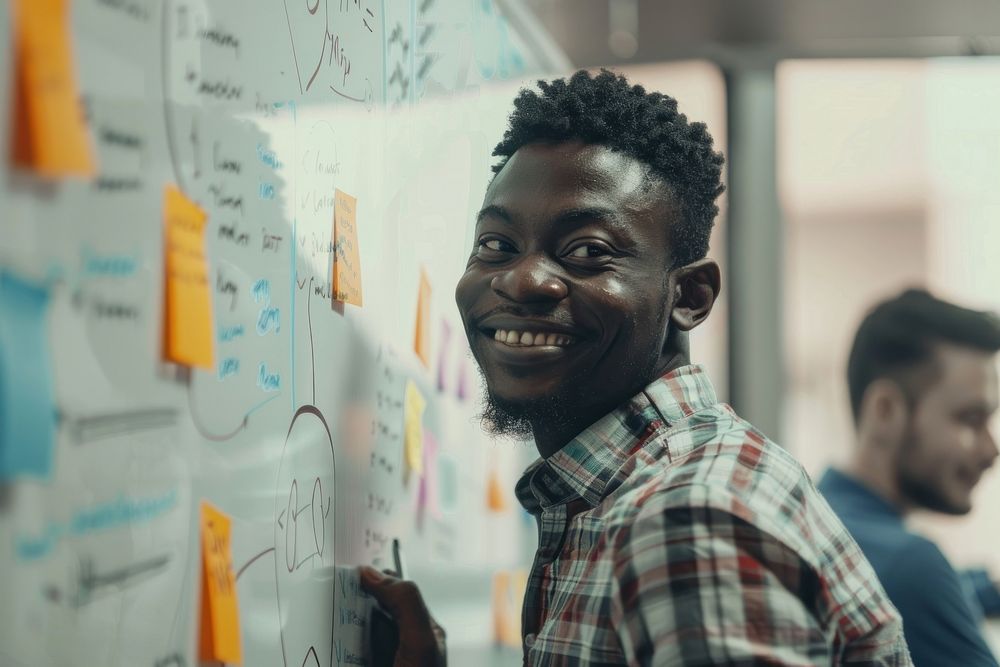 African man writing smiling office adult.