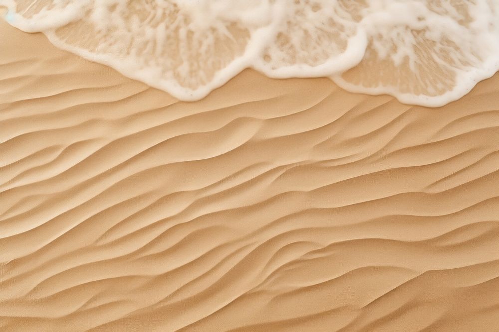 Wave pattern on sand backgrounds outdoors nature.