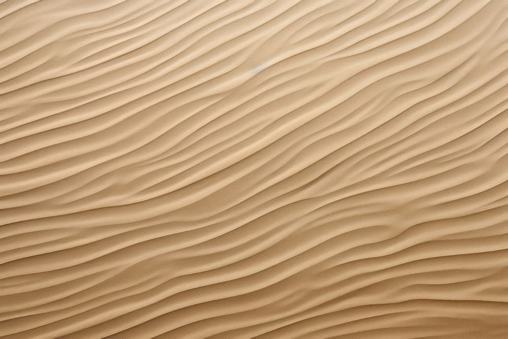 Wave pattern on sand backgrounds outdoors texture.