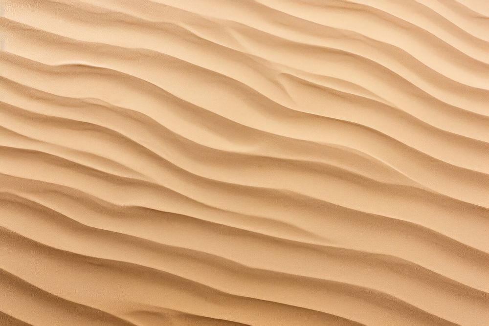 Wave pattern on sand backgrounds outdoors desert.