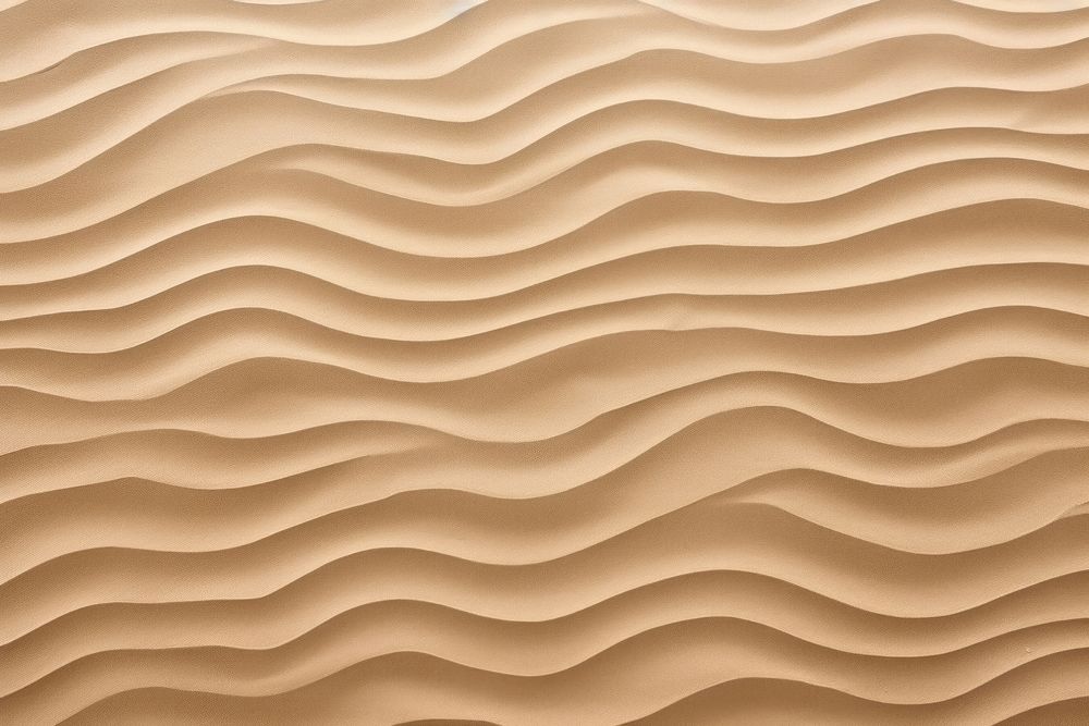 Waves pattern on sand backgrounds texture nature.