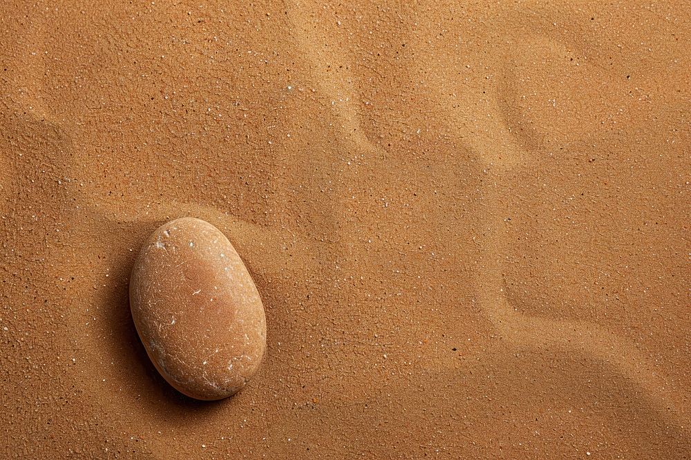 Wishbone pattern on brown sand backgrounds nature rock.