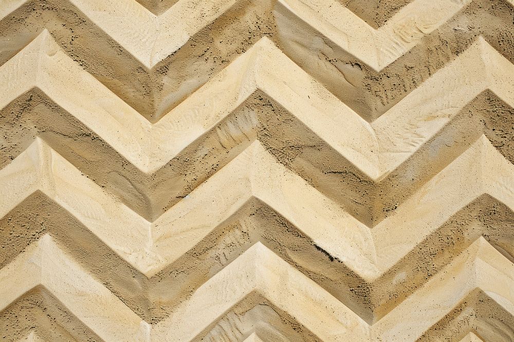 Zig zag pattern on sand architecture backgrounds texture.