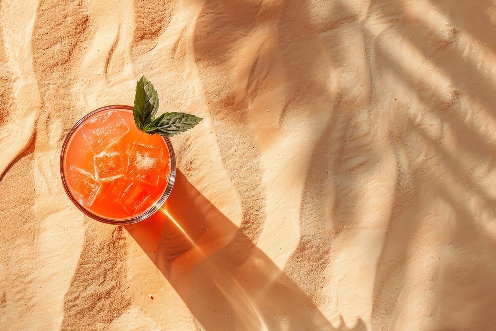 Cocktail on sand drink fruit juice.