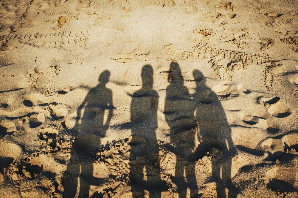Family shadow on sand outdoors beach adult.