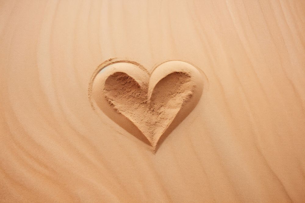 Heart on sand backgrounds outdoors nature.