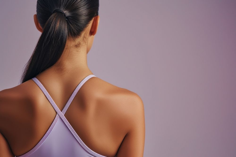 Woman back wearing yoga outfit purple adult pink.