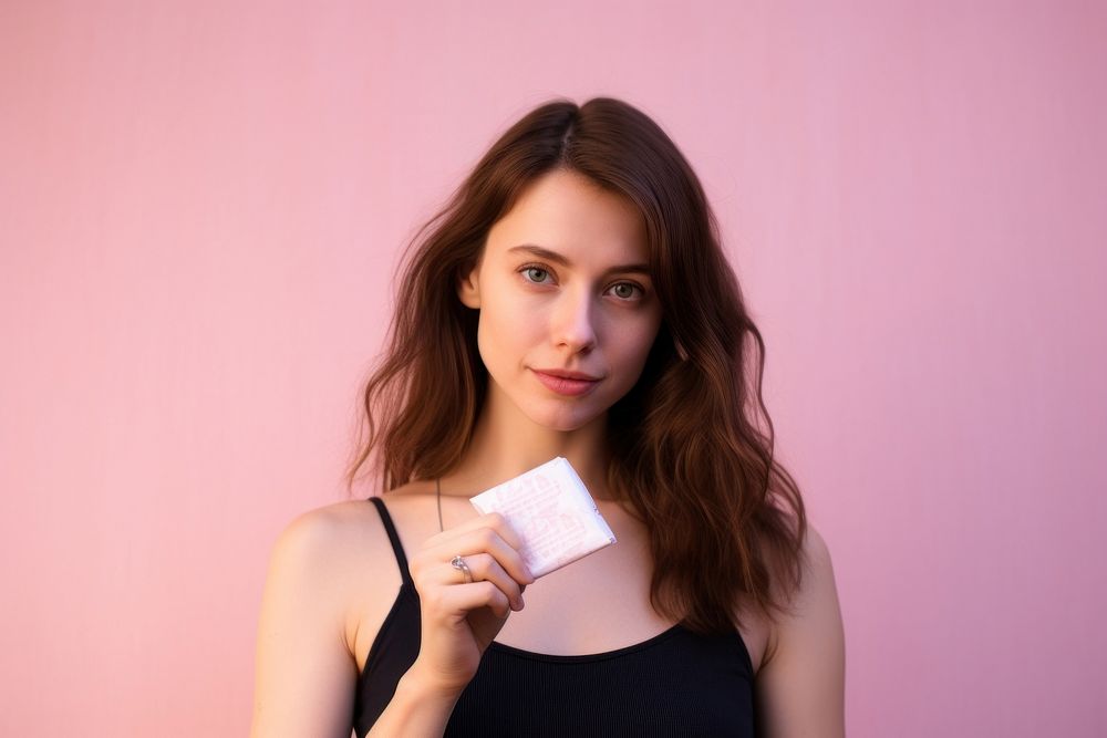 Hold menstrual product portrait photo pink.