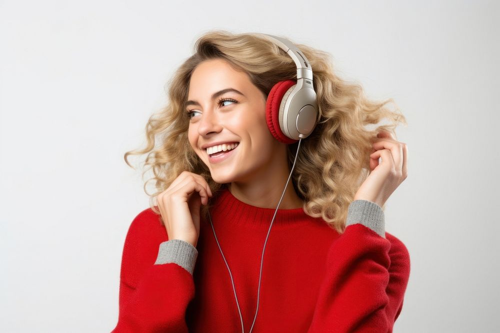 Young woman blond long hair enjoying happy and cheerful headphones listening headset.