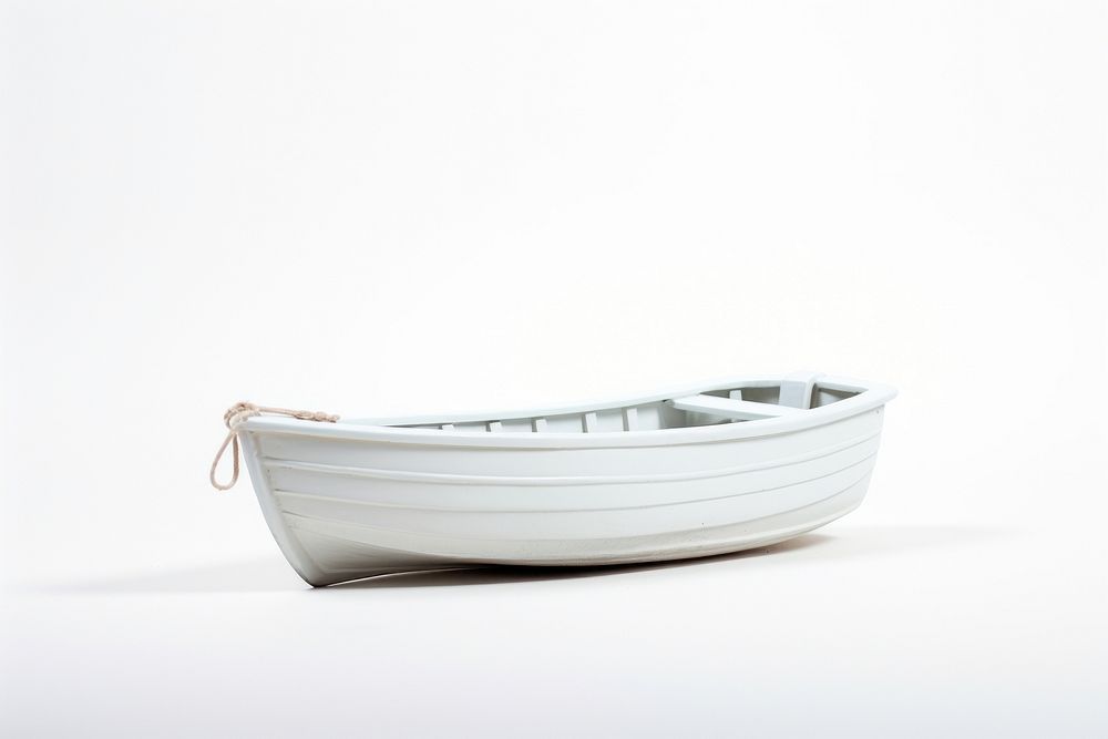 Little white boat watercraft vehicle rowboat.