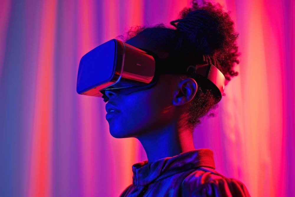 Black woman wearing vr glasses portrait purple photo.