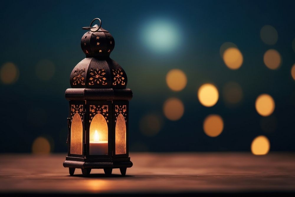 Ornamental Arabic lantern lighting glowing.