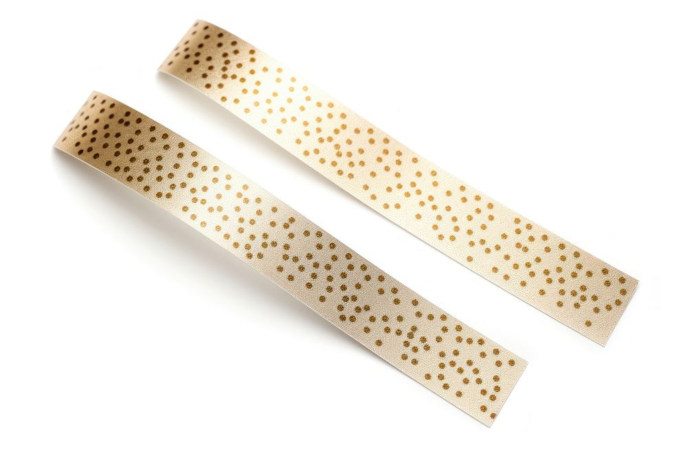White gold dot pattern adhesive strip white background bling-bling accessories.