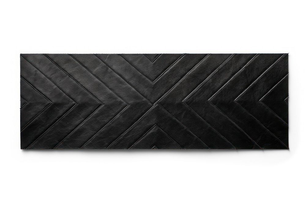 Black geometric shape adhesive strip white background rectangle textured.