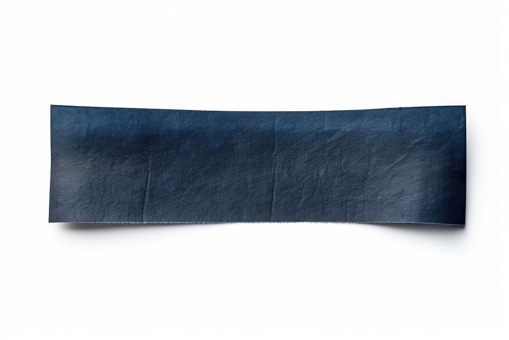 Dark blue adhesive strip denim paper white background.