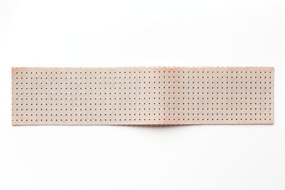 Dot pattern adhesive strip bandage white background rectangle.