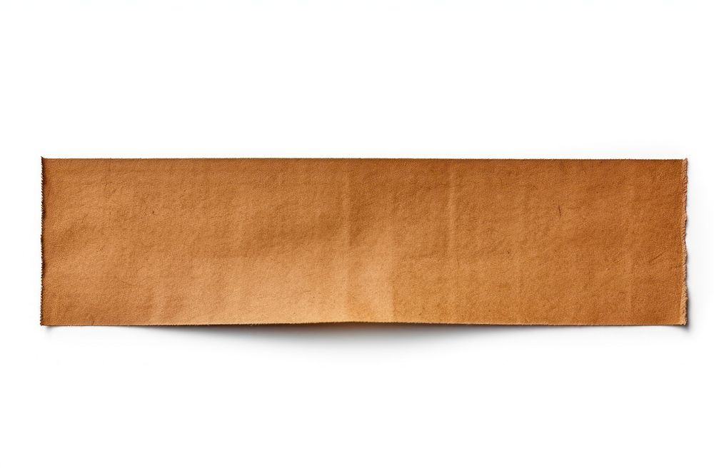 Earth tone adhesive strip paper white background simplicity.