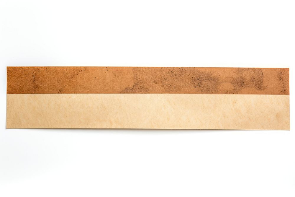 Earth tone adhesive strip plywood paper white background.