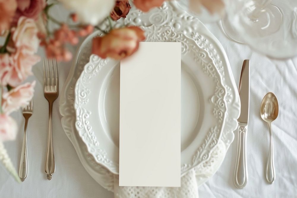 Blank white card on plate
