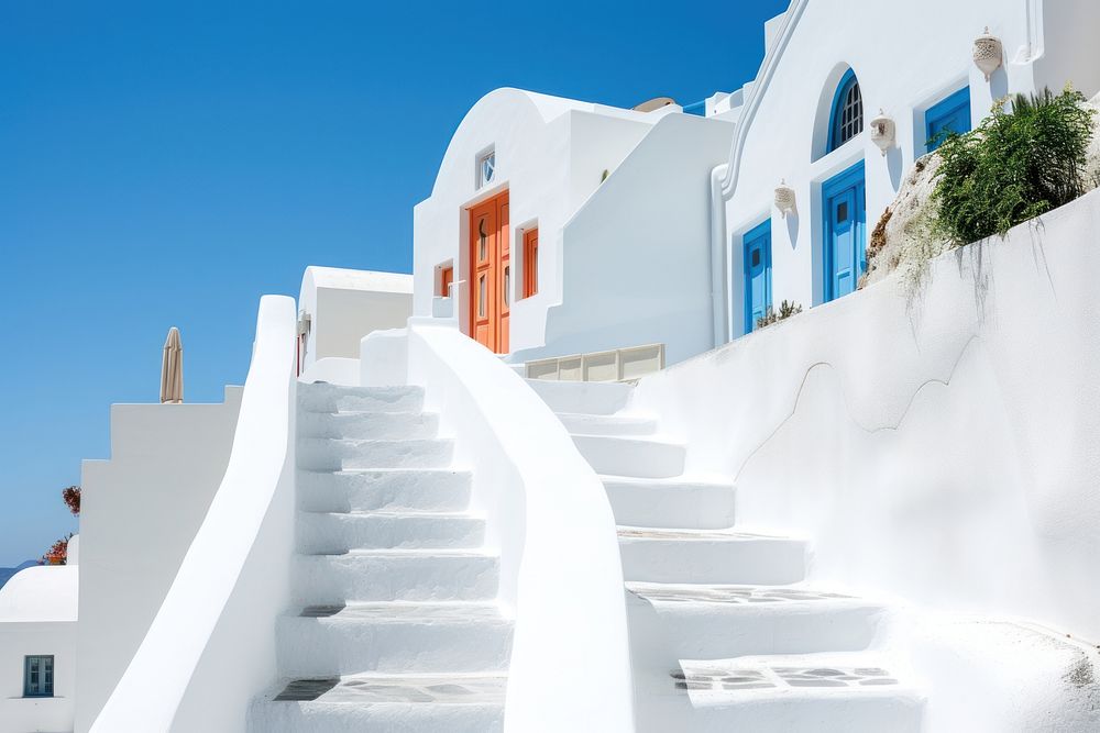 White architecture of Oia village staircase building house.