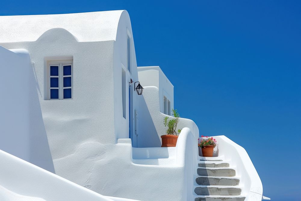 White architecture of Oia village staircase building house.