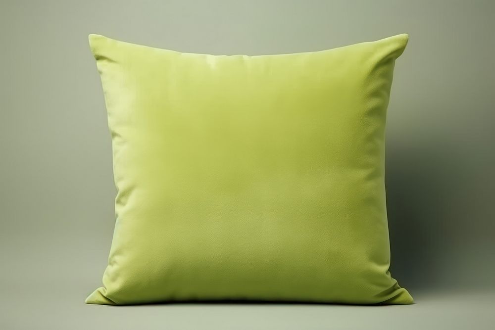 Green velvet cushion pillow backgrounds yellow simplicity.
