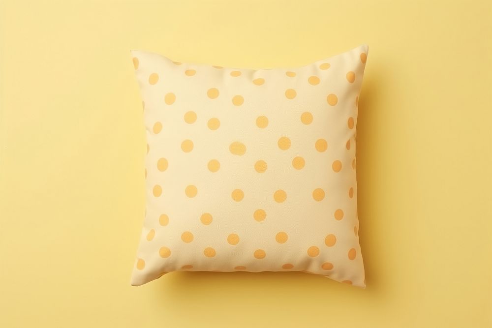 Polka dot printed cushion pillow backgrounds yellow simplicity.