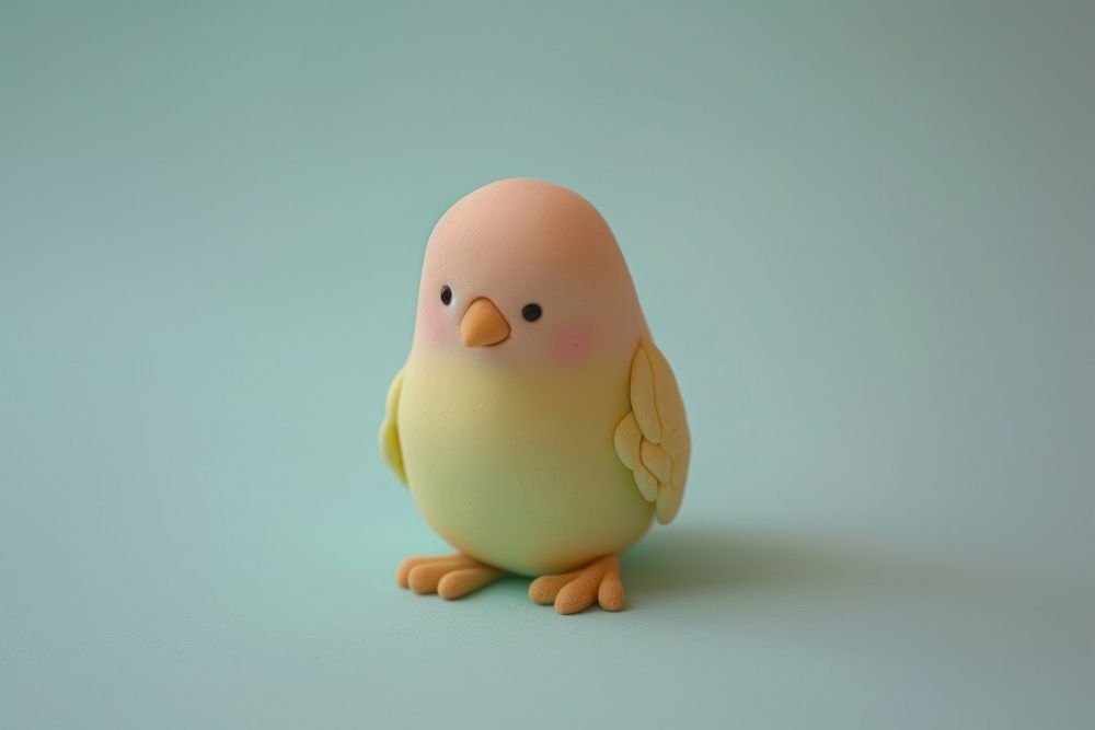 Pastel polymer clay style of a baby chick animal bird toy.