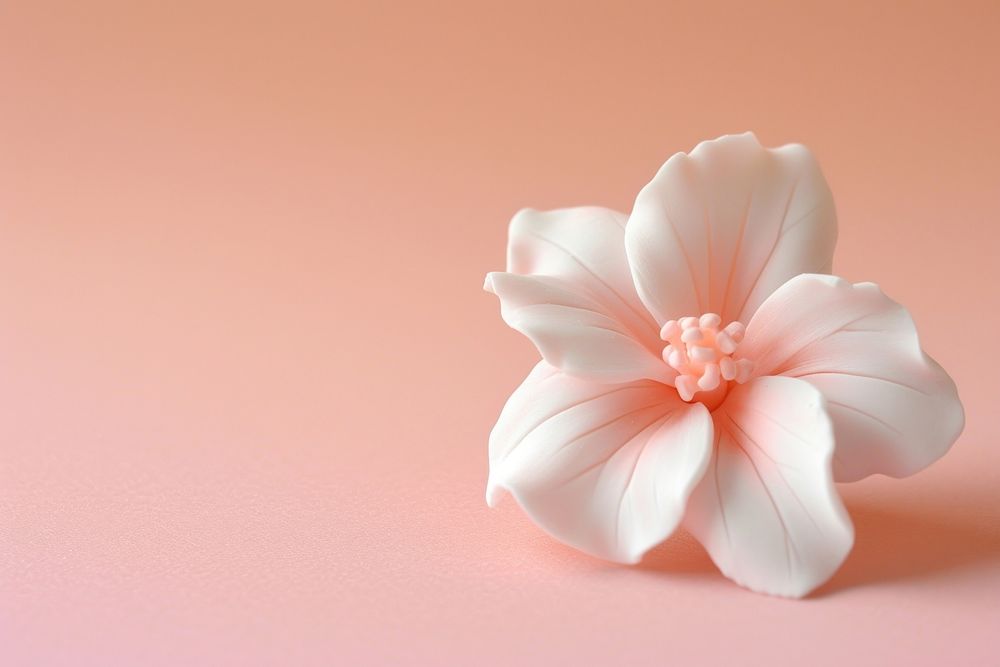 Pastel polymer clay style of a flower blossom petal plant.