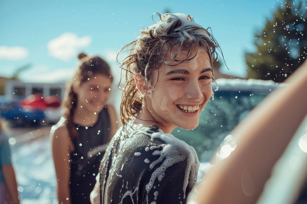 Carefree teenagers organize charity car wash photography carefree laughing.