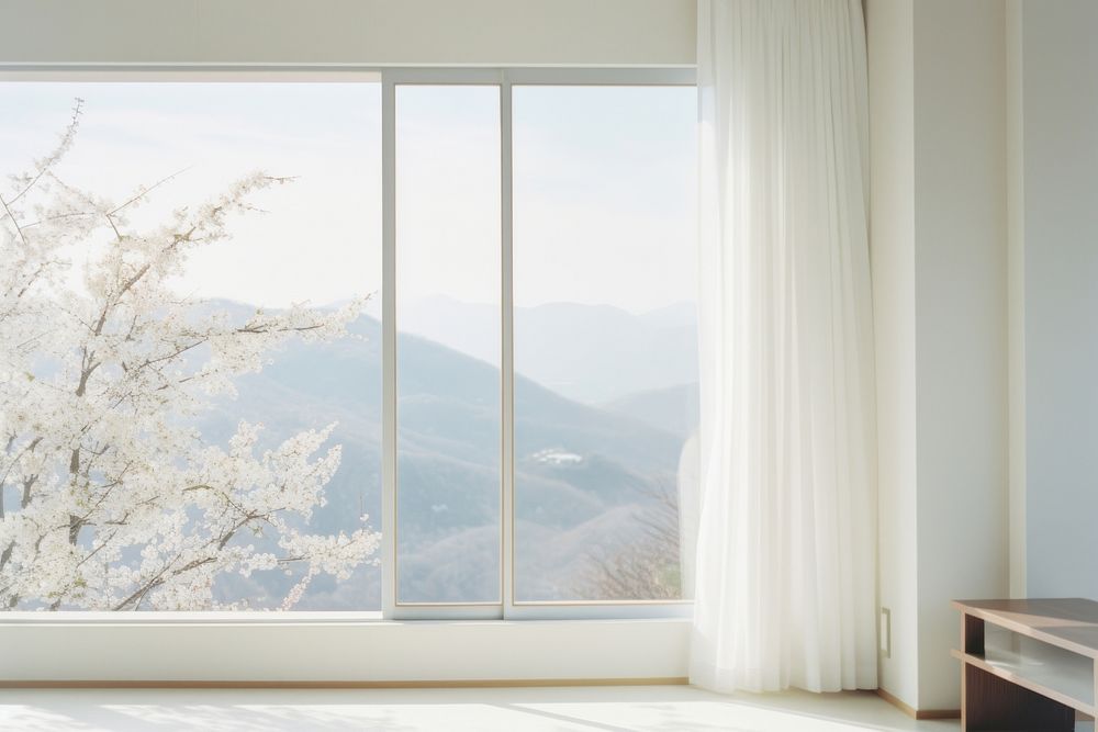 Minimal Japanese hotel interior with the scenery outside the window nature white architecture.