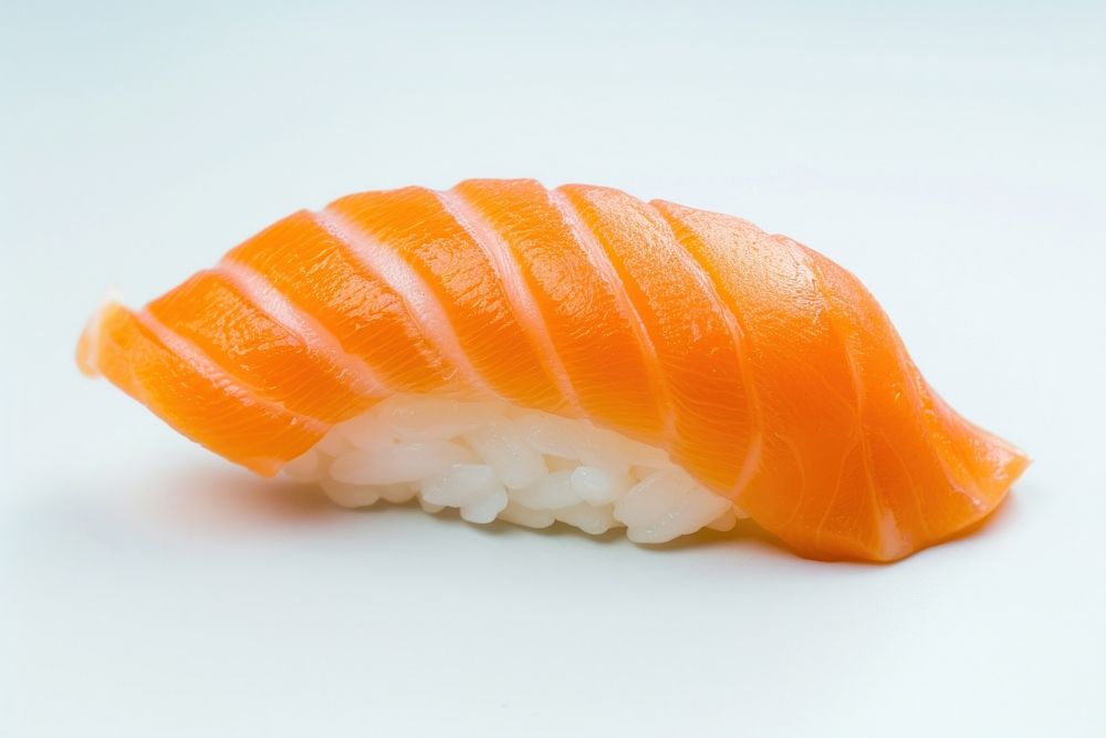 1 bite Nigiri sushi with salmon seafood rice dish.