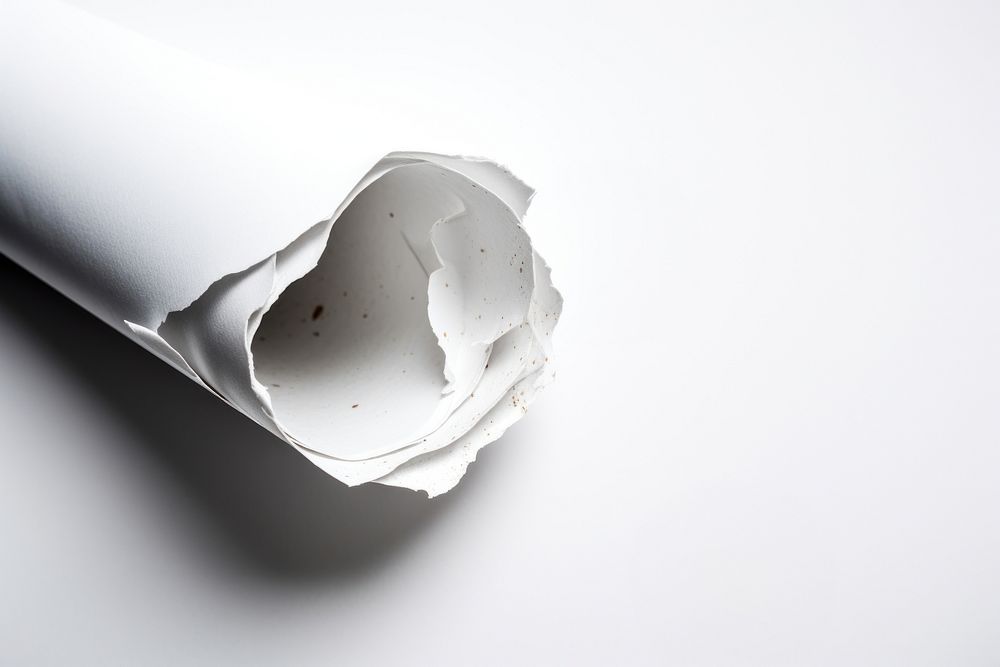 Rolled paper white white background text.