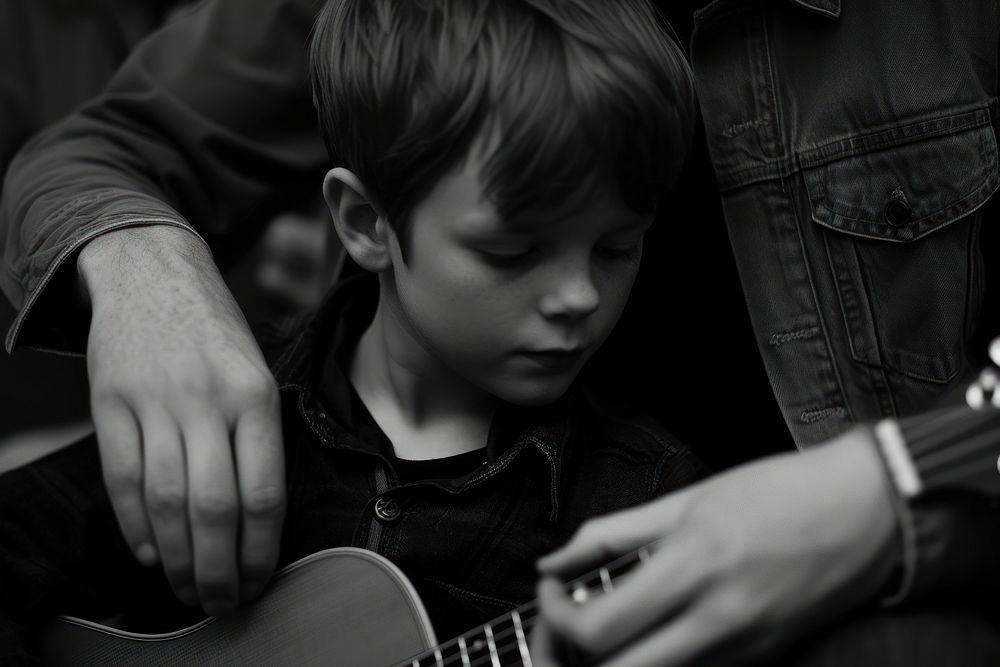 Teaching a guitar musician finger person.