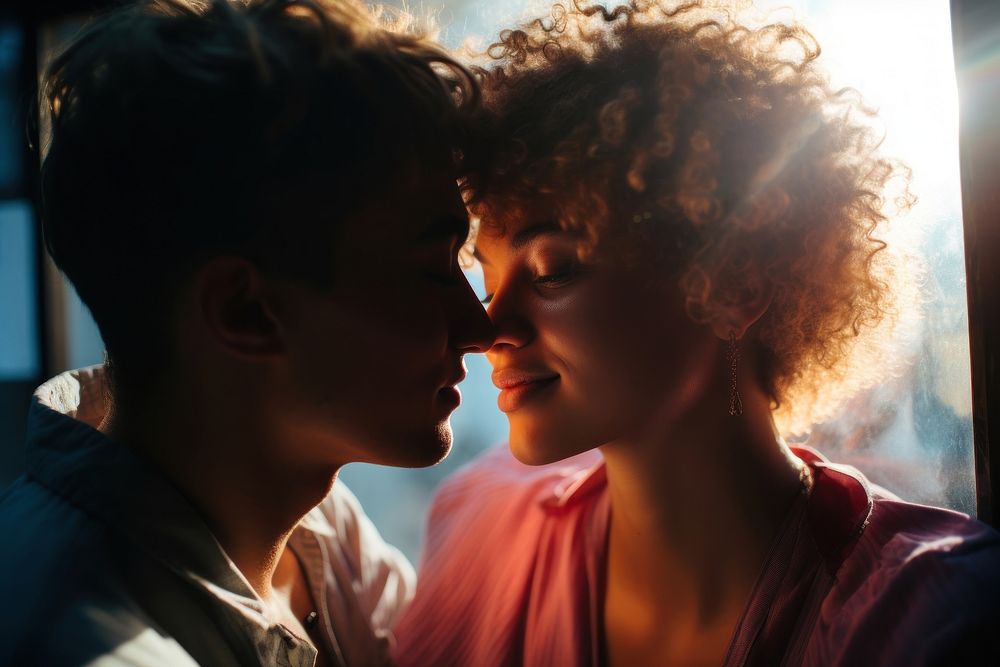 Queer girl couple portrait kissing adult.