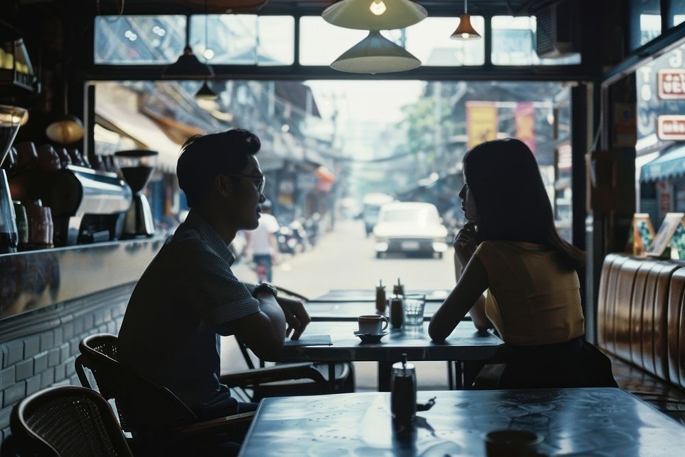 Thai man and girl restaurant table adult.