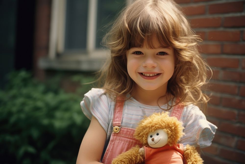 Young American girl portrait smiling holding.