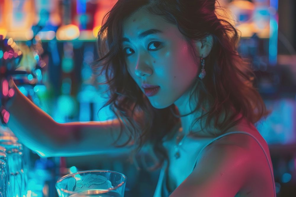 Young asian woman adult blue bar.