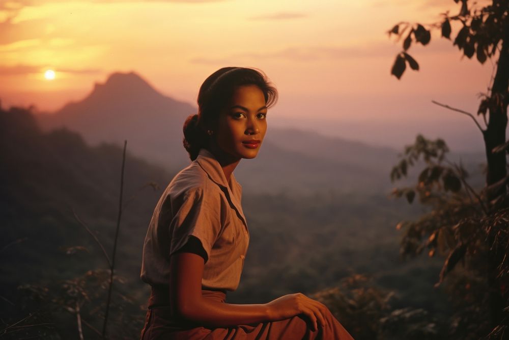 Young Thai woman mountain portrait outdoors.