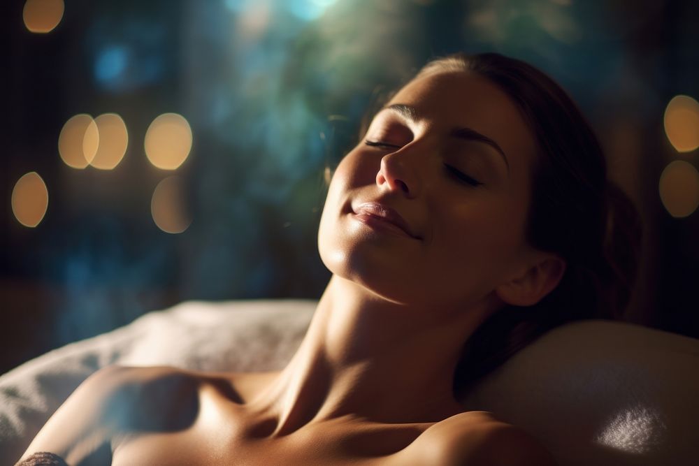 Woman at massage therapy light adult night.